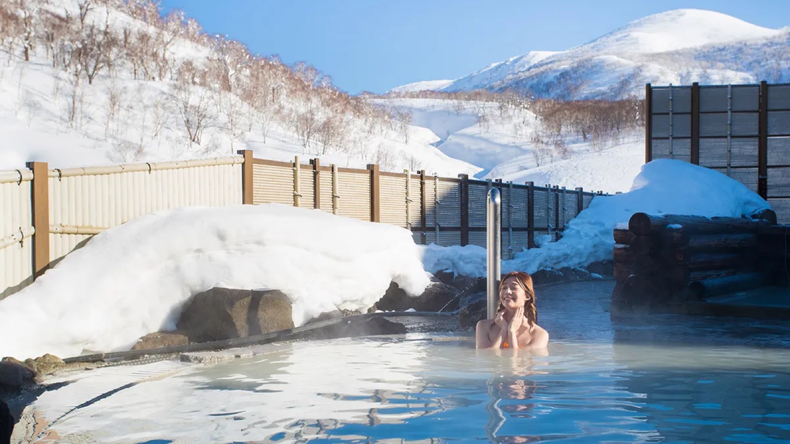 Outdoor onsen with mountain views